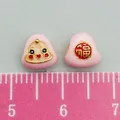Pink Zongzi shaped spacer beads with smiley face and Fu character for DIY jewelry - Small Pink Straight Hole Smiley Zongzi (22641)