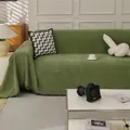 Green herringbone pattern sofa cover blanket with fringe detail in a modern living room - 180*130 / Green