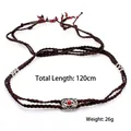 Ethnic handmade braided hair rope accessory with silver charms and red beads, 120cm long - Ethnic Tassel Necklace (BN-0249) / Brown Rope Red Point