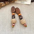 Orecchini etnici in legno con sfere di raffia e perle geometriche in tonalità terra - 17# Perno in argento - Marrone
