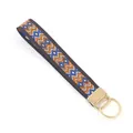Ethnic embroidered wristlet keychain with blue and orange geometric pattern. - Size 11