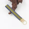 Ethnic style embroidered webbing keychain with geometric pattern and gold clasp - 16#