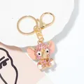 Detail shot of a sparkling pink rhinestone elephant keychain with gold-tone hardware - Style 5