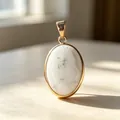 Elegant oval white howlite stone pendant with gold-plated bezel for necklaces - Howlite Pendant / 1 Piece/Pack / White