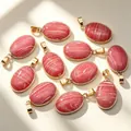 Elegant oval natural stone agate pendant with gold plated copper edge in reddish pink - Rhodochrosite Pendant / 1 Piece/Pack / Red Stripes