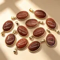 Eleven sparkling reddish-brown Goldstone oval pendants with gold-plated frames for necklaces - Gold Sandstone Pendant (Synthetic) / 1 Piece/Pack / Golden Sand