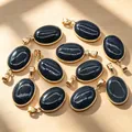 Set of oval blue sandstone pendants with shimmering gold plated copper edging - Blue Sandstone Pendant (Synthetic) / 1 Piece/Pack / Blue Sandstone