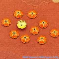 Detailed view of 9mm orange enamel flower bead caps for DIY jewelry making - 9mm / Orange (P123)