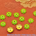 Close-up of 9mm green enamel flower spacer beads for handmade DIY jewelry making - 9mm / Light Green (P128)