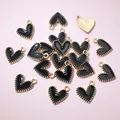 Close-up of black alloy heart pendants with gold beaded edges for DIY jewelry making crafts. - Aj5-09 (16x13mm 0.8g)