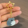 Simpatico portachiavi a forma di koala in lega di zinco con chiusura a stella dorata - Koala Peloso