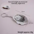 Realistic PVC simulation oyster shell keychain, size 6x3.7cm, weight approximately 18g. - Original Flavor Oyster-Keychain