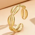Elegant gold stainless steel open ring featuring a minimalist cowrie shell design for women - J03132 / Gold