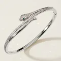 Elegant silver snake bangle bracelet paved with shimmering crystals and green emerald eyes - Silver Snake Bangle with Green Eyes BS-J5513S