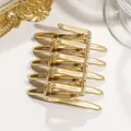Elegant golden criss-cross hair insert comb for casual hair styling and updos - Metallic Gold