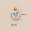 Gold-plated circular pendant with blue painted heart and copper material details - Blue Heart Pendant