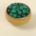Polished green agate round beads for DIY jewelry making displayed in a small ceramic bowl - 7A Green Agate / 10mm Diameter Approximately 1.2mm Aperture 38 Carefully Selected Beads.