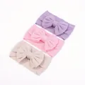 Lot de trois bandeaux bébé extensibles à côtes avec grands nœuds en couleurs pastel - Stéréoscopique 3D