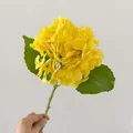 Yellow artificial hydrangea flower with realistic 3D moisturizing texture and green leaves - Yellow