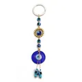 Evil eye glass pendant keychain featuring golden beads and woven cord for a lucky charm gift - Golden Bead Ring Style (NB204BU)