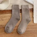 Cozy thick brownish-grey thermal winter socks for women with a wool-like texture - One Size / Light Coffee