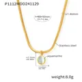 Detailed view of the aquamarine oval pendant on a gold stainless steel snake chain - P1112 - Soft Snake Chain Aquamarine Necklace