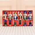 Set of 6 classic wooden 13cm nutcracker soldier puppets in a festive red gift box display. - M13602 Honor Guard Walnut Set Of Six