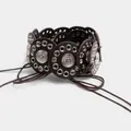 Detailed view of ethnic style wide belt with vintage metal discs and braided cords - 160cm / Thin Round Rope Style / Bright Silver Coffee