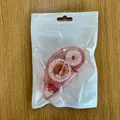 Pink 8m double-sided glue tape dispenser presented in a transparent retail bag - English Version Of Dot Glue 8 Meters * 8mm; 0103 - Pink