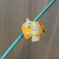 Translucent orange fish claw clip with iridescent stripes for fine hair styling - Yellow Clownfish