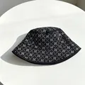 Luxury black bucket hat with a full rhinestone letter N pattern and wide sun-shading brim - Black/White Zirconia / M (56-58cm)