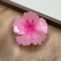 Elegant pink gradient hibiscus flower hair claw clip with a glossy finish for women - Peach Pink