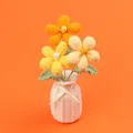Beautiful handmade crochet daisy flowers potted in a white vase for home tabletop decor - Gradient Yellow Frangipani (Yarn Vase)