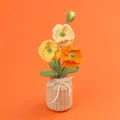 Handmade crochet flower potted plant with yellow and orange blooms in a beige vase - Gradient Yellow Poppy (Beige Vase)