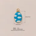 Blue oval stainless steel pendant with white cloud oil-drop pattern and gold frame. - Blue Cloud Pendant