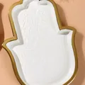 Elegant white ceramic hamsa hand jewelry dish with gold rim and embossed floral detail - Hand Tray / White