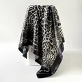 Elegant leopard print satin square scarf with a smooth silk-like finish and black border. - D9446 - Black And White / 90x90cm