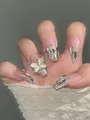 Detailed close-up of handmade cat-eye press-on nails featuring a 3D silver butterfly - By85 / Handmade Size M#10 Pieces/Bag