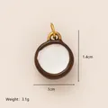 Small minimalist stainless steel circular pendant charm with brown rim and white center - Coconut