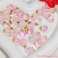 Macro view of pink peach crystal pendants with gold caps for DIY jewelry making - Peach Pendant (S419)