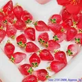 Macro view of translucent red crystal strawberry charms for DIY jewelry making crafts - Glass Strawberry Pendant (S422)