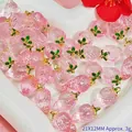 Detailed view of pink strawberry charms for DIY jewelry making with gold loops - Glass Strawberry Pendant (S421)