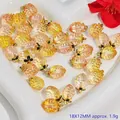 Close-up detail of 18x12mm crystal peach pendants for DIY handmade jewelry making - Strawberry Pendant (S418)