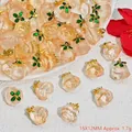 Detailed close-up view of peach-shaped crystal pendants for DIY jewelry charms - Rose Pendant (S402) / 15x12mm / Champagne
