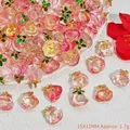 Detailed view of pink crystal peach charms with green leaves for DIY jewelry making. - Rose Pendant (S404)
