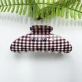 Red and white gingham hair claw clip with black bow prints for stylish hair styling - Arc Pattern Six