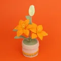 Exquisite handmade crocheted orange lily flower plant in a soft pink knitted pot - Double-Head Lily (Tulip Lace Cylindrical Pot) / Orange