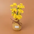 Handmade yellow crochet flower potted plant in a tan yarn pouch with leather bow detail - Honeysuckle Potted Plant (Large Yarn Vase) / Yellow