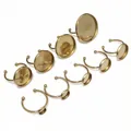 Macro view of various sized gold stainless steel adjustable ring trays for jewelry making. - 6mm (1g) / Bright Gold