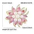 Macro detail view of luxury pink sunflower brooch featuring pearls and crystals - Pink 8139-pk